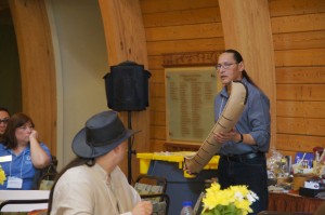 Mike Alloway from Forest County Potawatomi sharing the story of his gift for the gift exchange: the first canoe he ever made. created in a class taught by Marvin DeFoe from Red Cliff