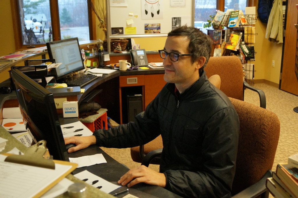 Omar buying Ojibwe Language books for the Native Nonfiction Collection