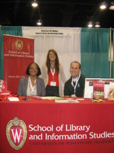 Janetta, Robin, and Jake staffing the SLIS booth