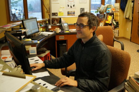 Omar buying Ojibwe Language books for the Native Nonfiction Collection